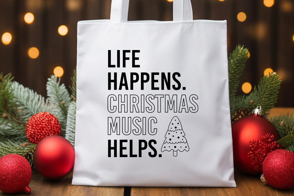 Life Happens Christmas Music Helps SVG Tote bag Mockup image.jpg